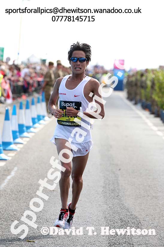 Hiroaki Sano finishing the mens 2014 BUPA Great North Run. Photo: David T. Hewitson/Sports for All Pics